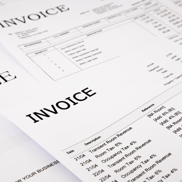 Close-up stack of invoices ready for invoice factoring